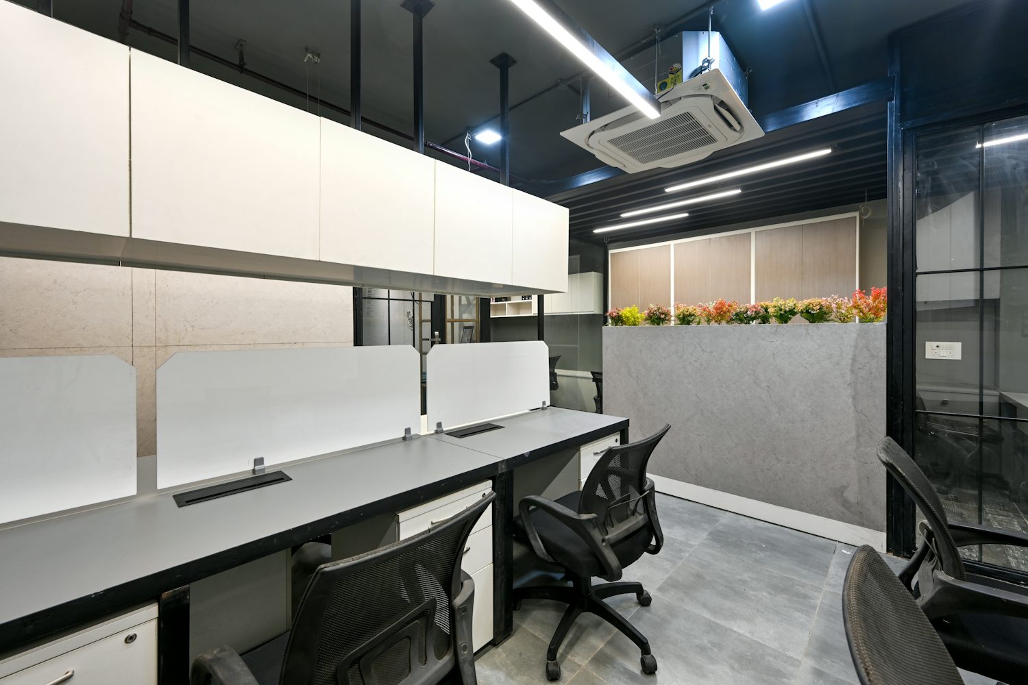 Open plan office with ceiling-mounted air conditioning